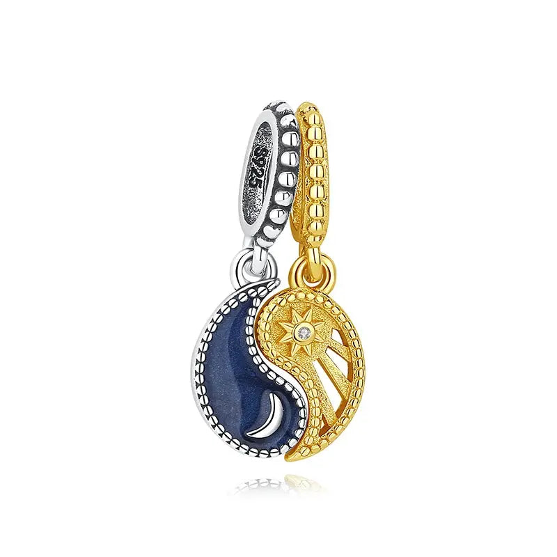 Sterling silver and gold-tone yin-yang charm pendant with blue enamel moon and sun/star accents, Simples Market
