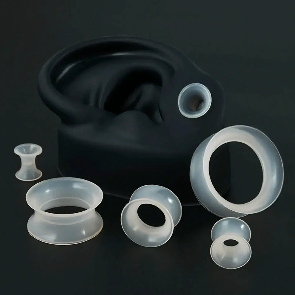 Set of 7 clear silicone ear tunnels, soft flexible double-flare flesh plugs for ear gauge expansion, by Simples Market