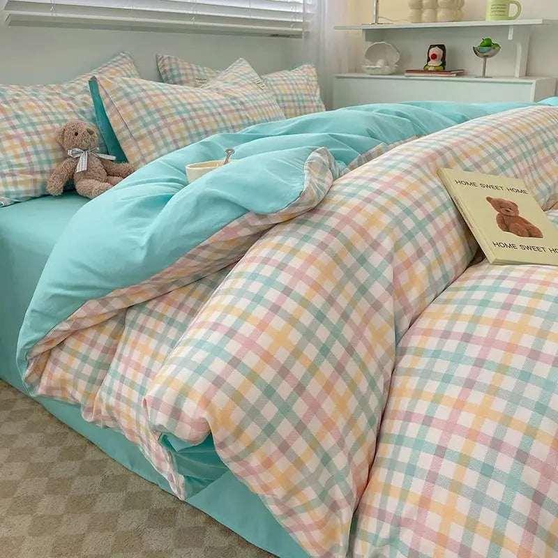 Cotton bedding set with Nordic plaid duvet cover and pastel plaid pillowcases and sheets