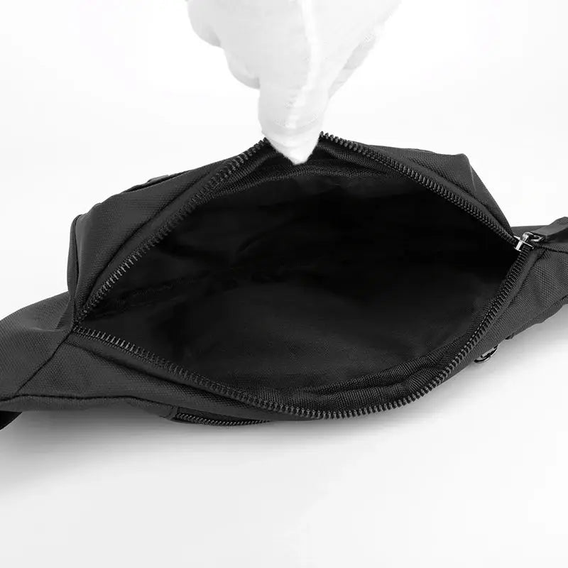 Waist bag black waterproof unisex with open zipper showing interior
