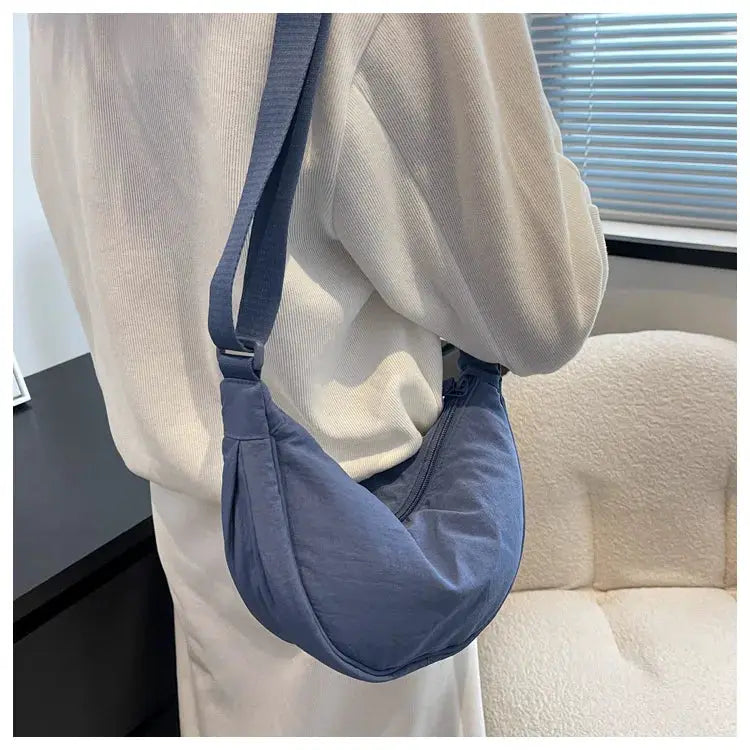 Simples Market casual nylon hobo crossbody bag in blue with long strap, women’s travel tote.