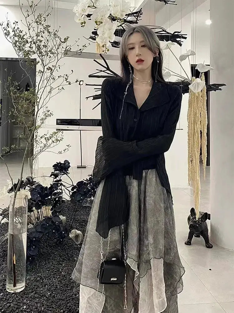 Karrram gothic black blouse with sheer, irregular hem; shown with layered gray skirt in dark aesthetic outfit