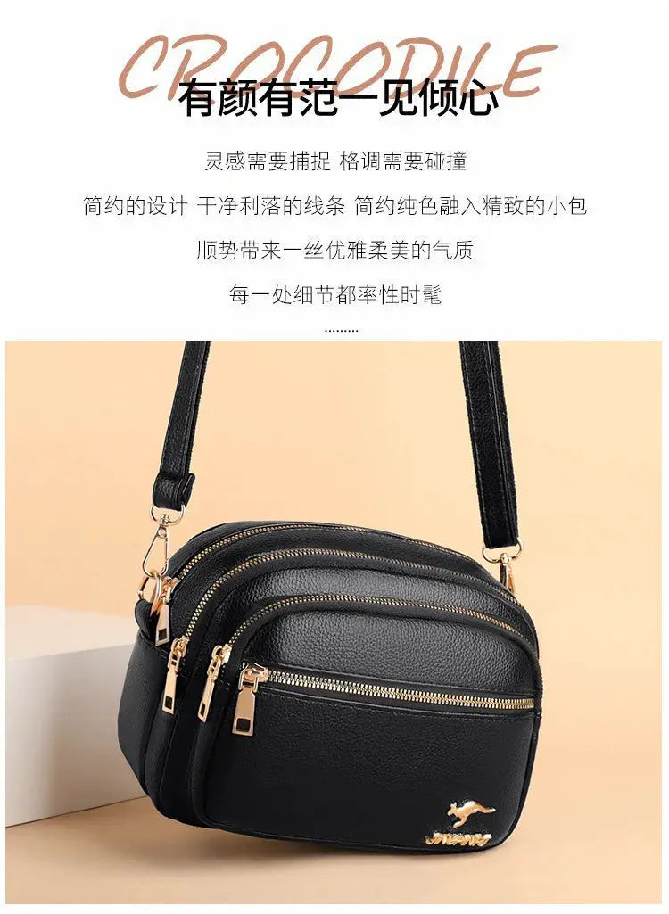Black soft leather shoulder bag with multiple zip pockets and gold-tone hardware by Simples Market