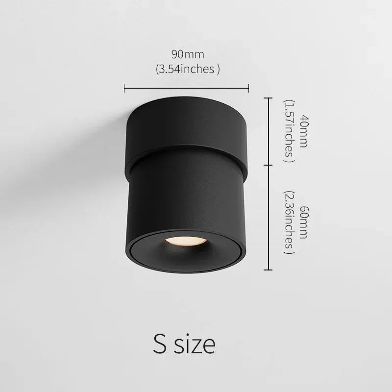 Aisilan LED ceiling spotlight, black cylindrical surface-mounted lamp with 360° rotation for indoor lighting.