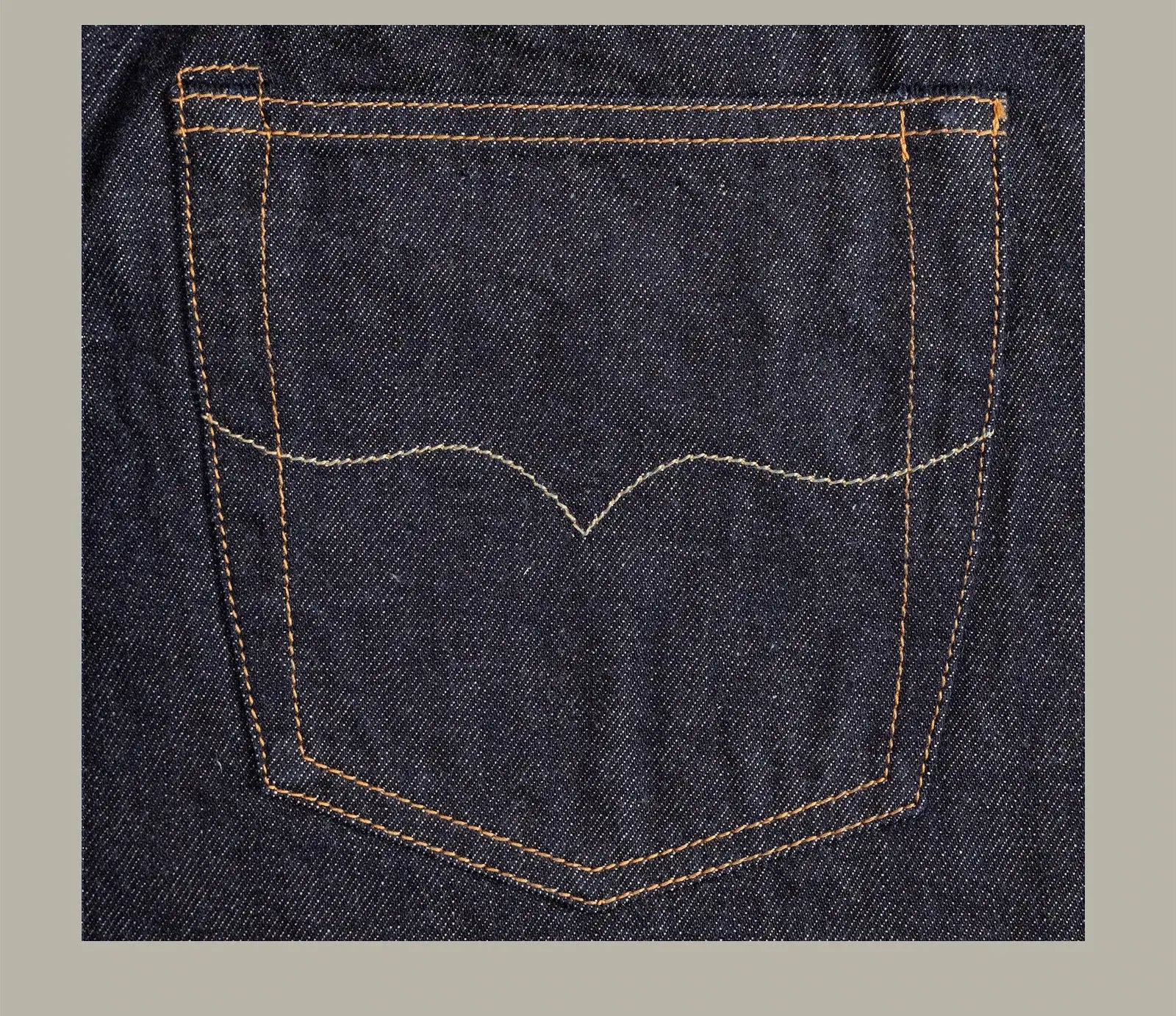 Denim jeans back pocket with orange contrast stitching, Simples Market Red Tornado