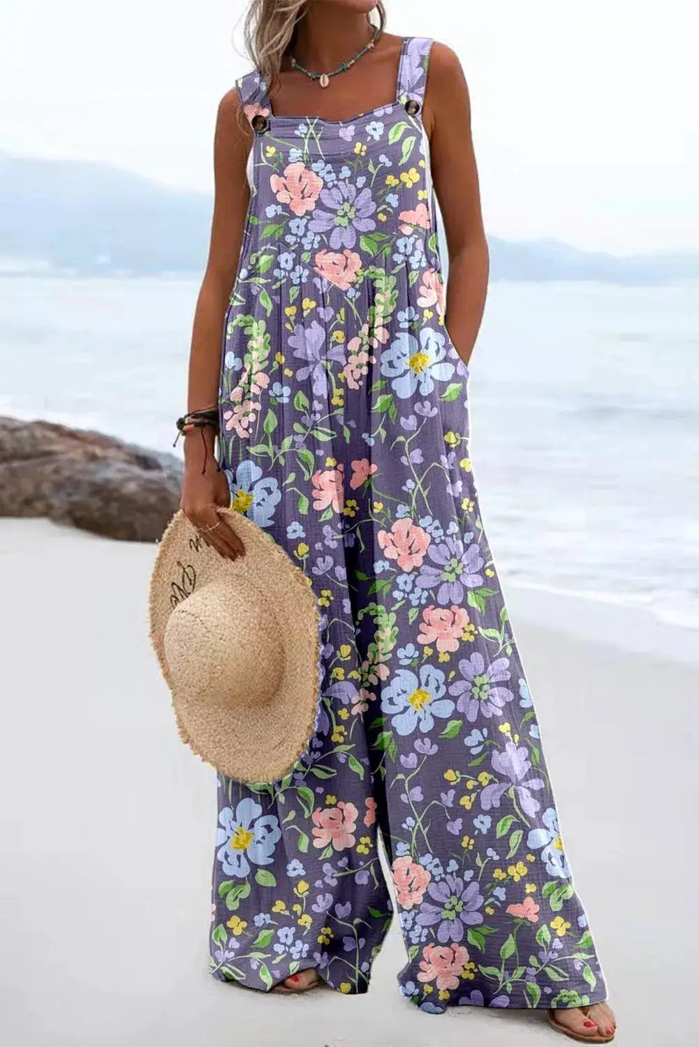 Floral sleeveless jumpsuit by Simples Market, purple vintage print with loose wide-leg silhouette
