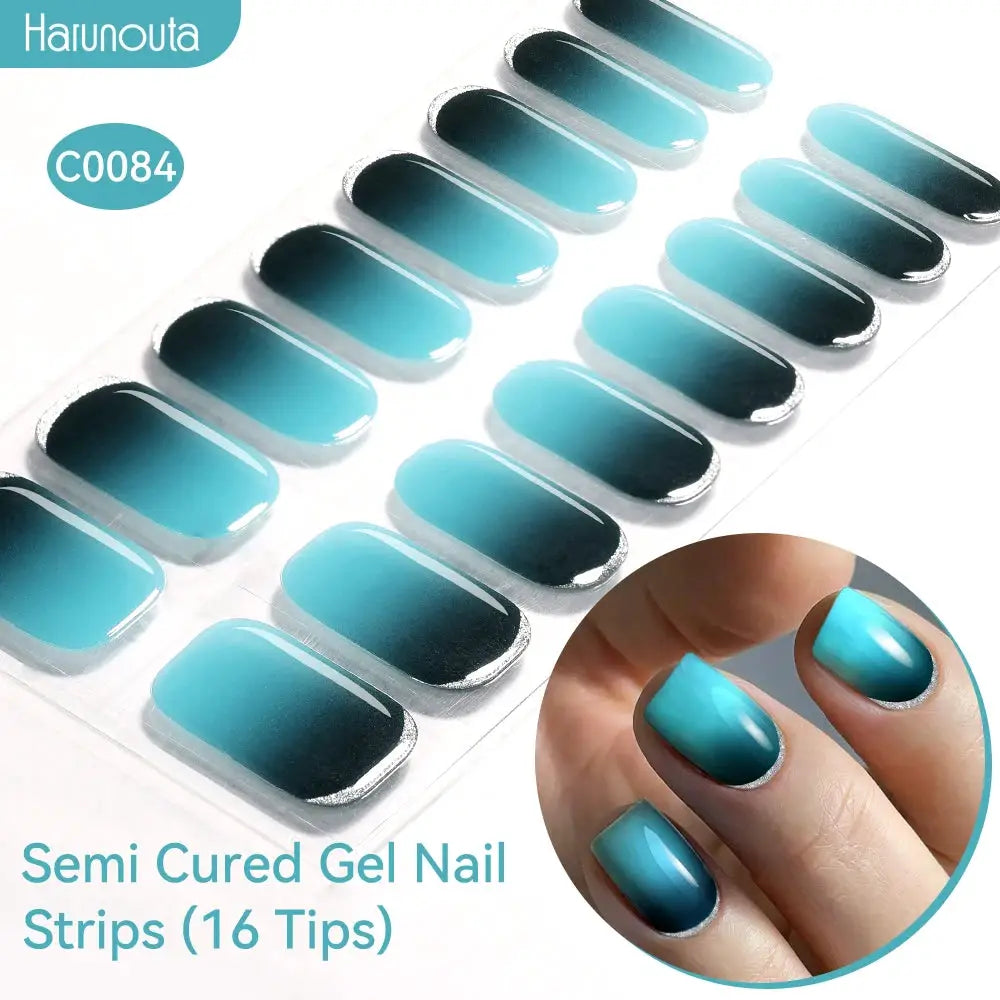 Gradient Auroras semi-cured gel nail strips, teal-to-navy gradient with silver glitter tips, 16 tips Harunouta