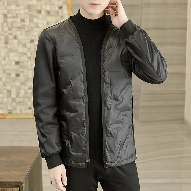 Men's quilted gray jacket with zip-front closure and ribbed cuffs