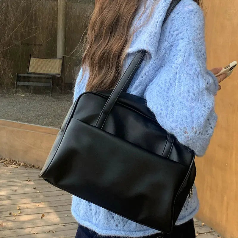 Korean Style large-capacity black faux-leather tote bag by Simples Market with double handles