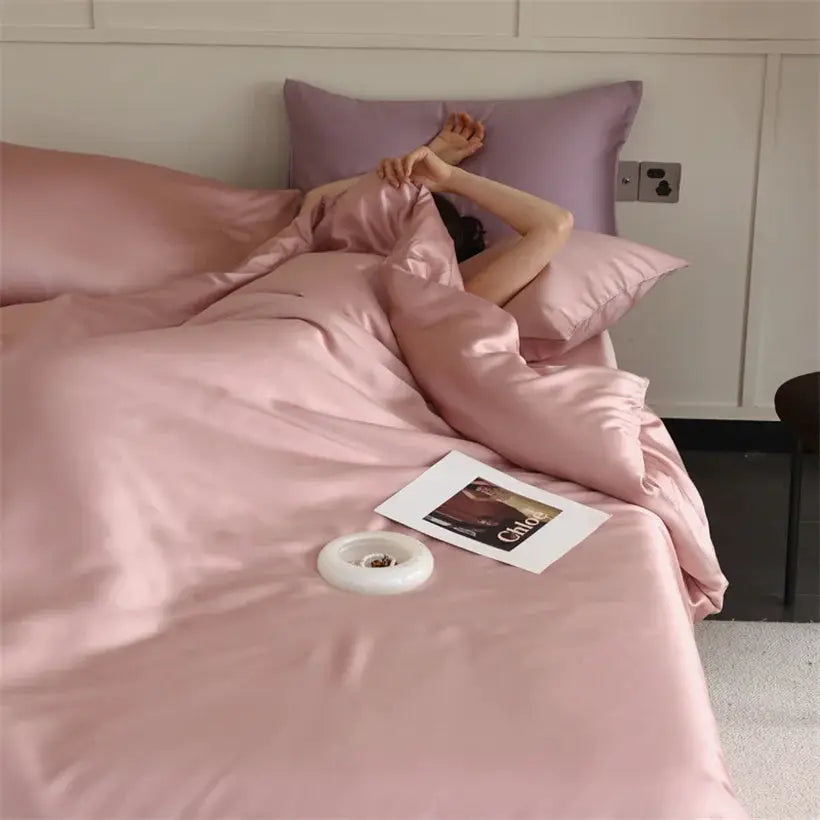 Mulberry Silk Bedding Set by Simples Market in blush pink silk with duvet cover and pillowcases on bed