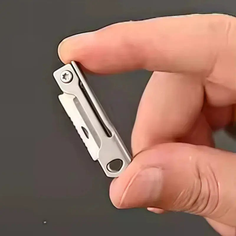 Mini stainless steel folding knife multitool keychain by Simples Market for outdoor camping and EDC
