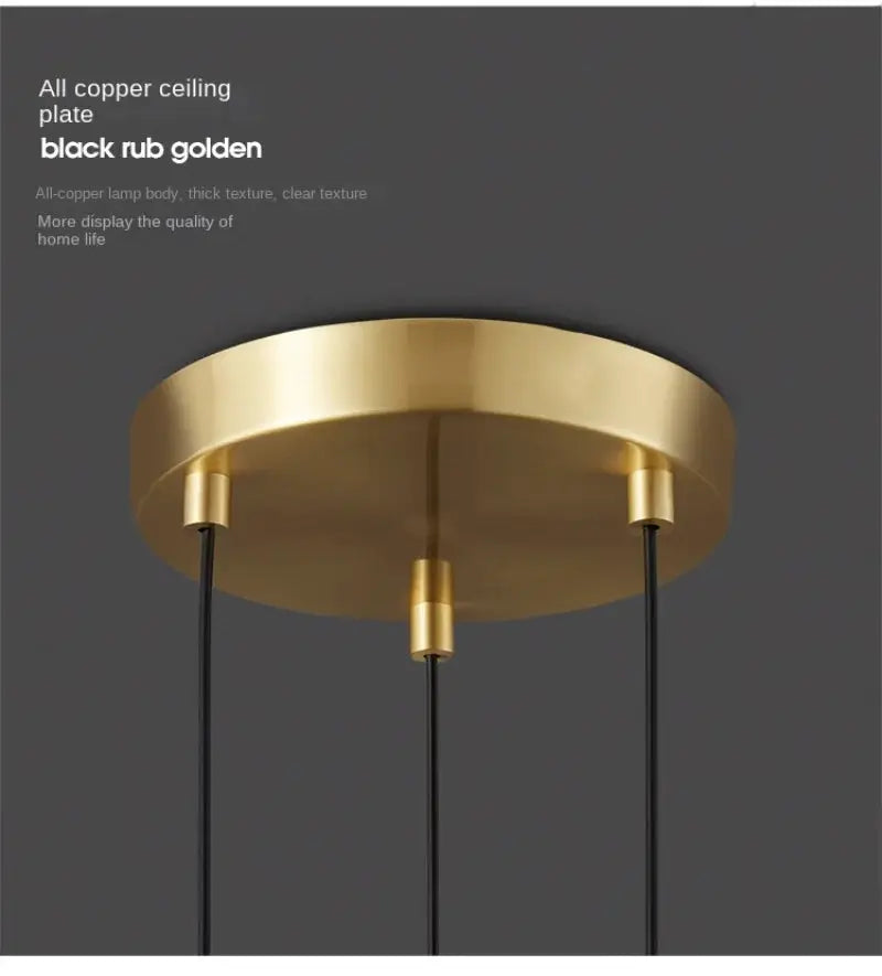 Minimalist Bedside Pendant Lamp by Simples Market, gold ceiling plate with three black cords.