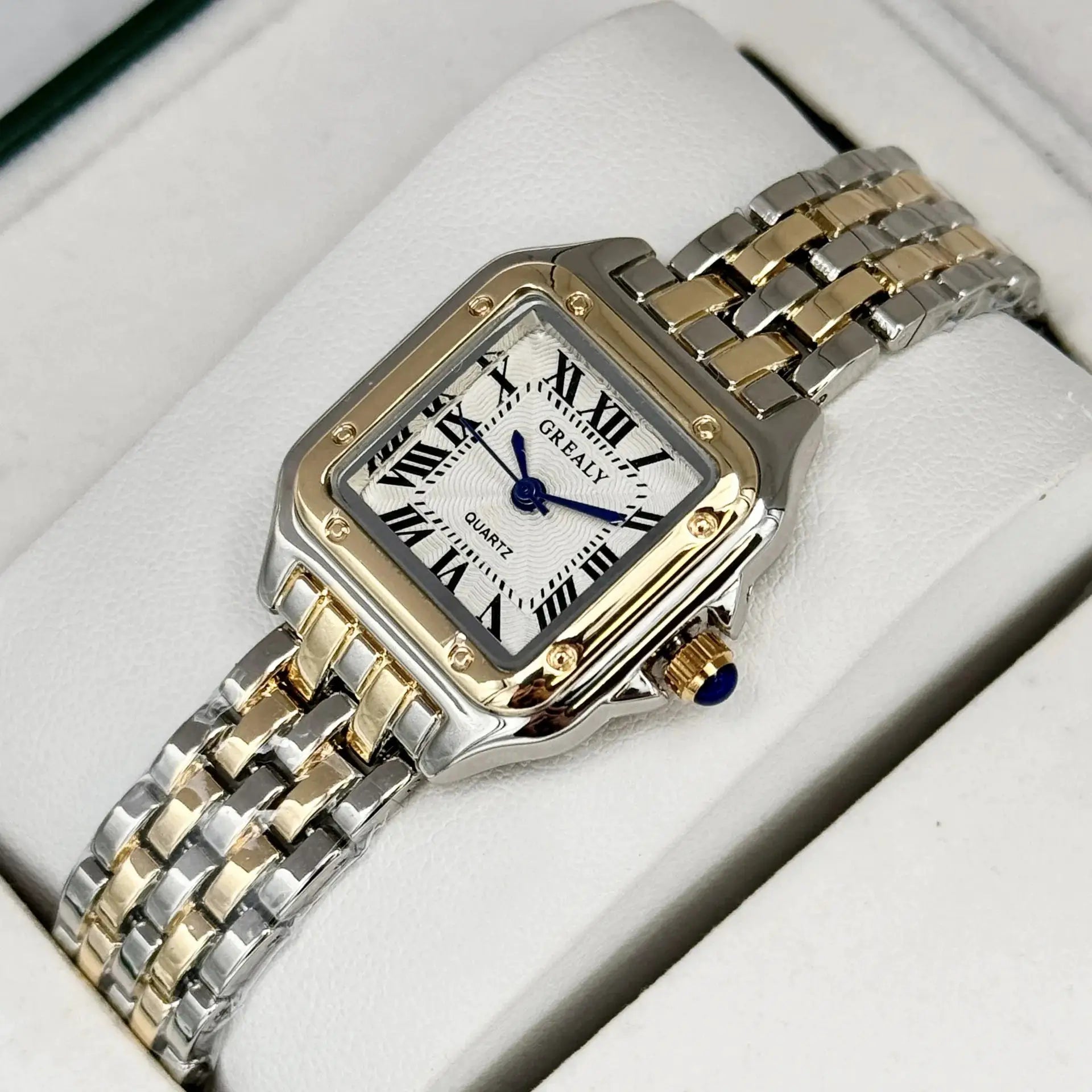 Two-tone gold and silver stainless steel women's wristwatch by Simples Market with rectangular face and Roman numerals