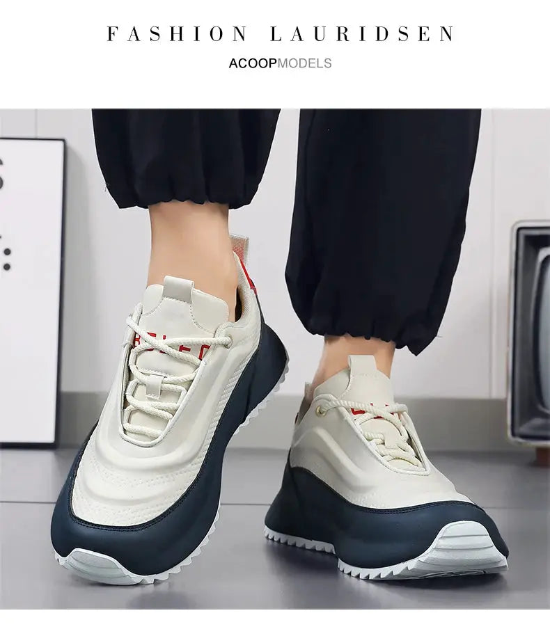 Pair of men's lightweight non-slip sneakers with cream uppers and navy sole, breathable casual running shoes