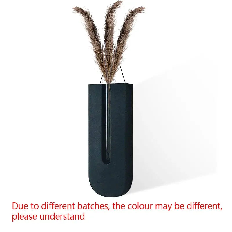 Wooden hanging wall planter vase in dark wood with dried pampas grass stems