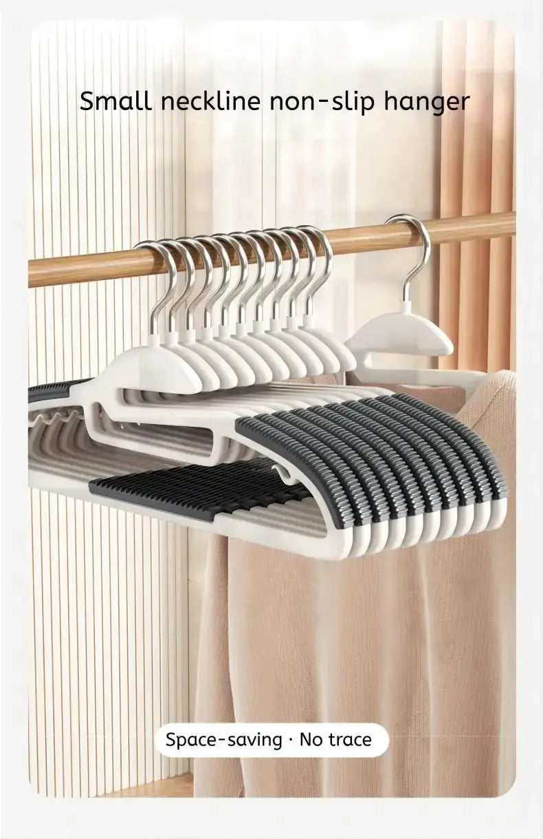 10-piece white plastic hangers with gray anti-slip grooves for wet and dry clothes; space-saving wardrobe set