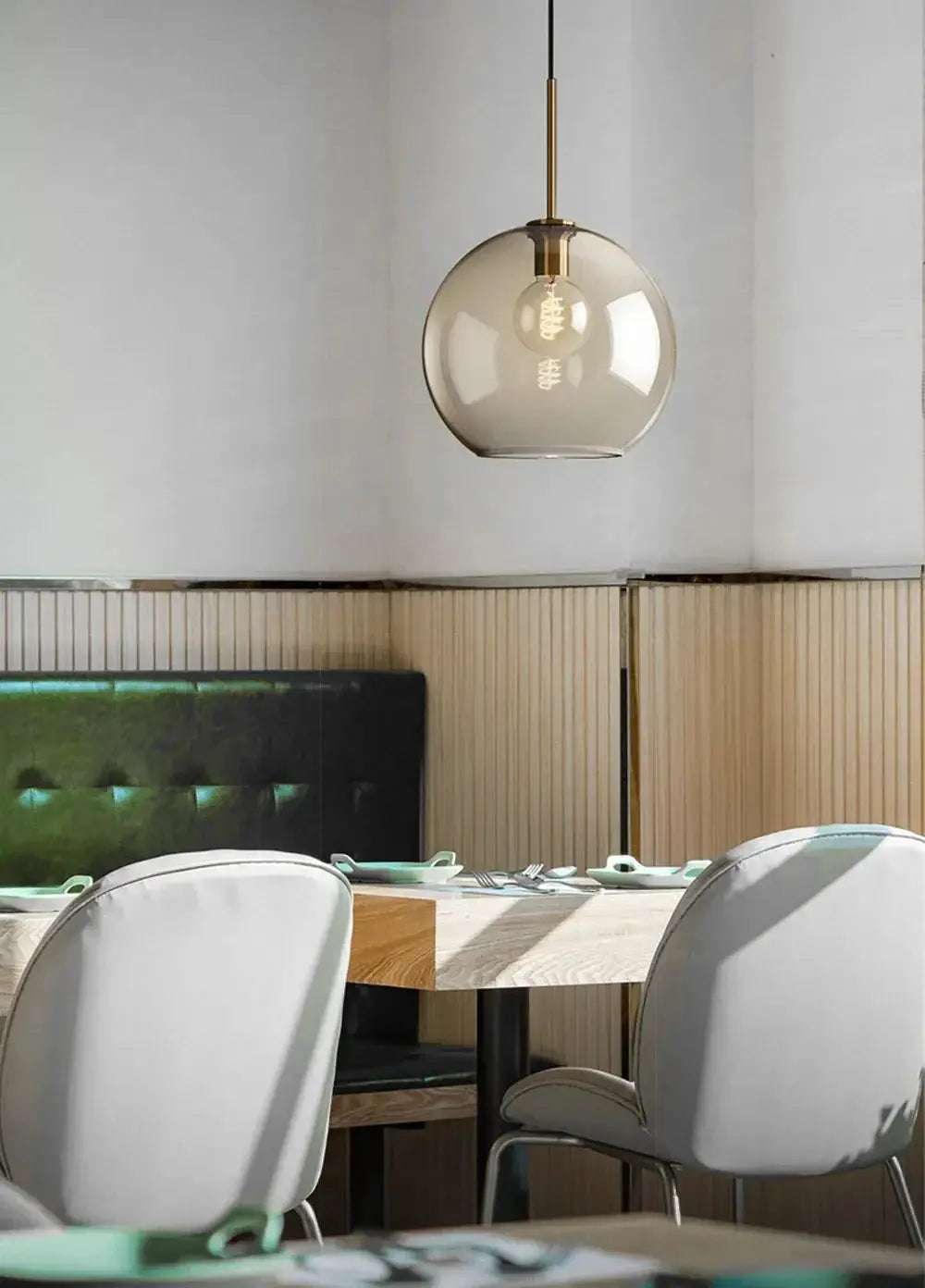 Nordic LED glass pendant light with smoky beige sphere and brass hanging fixture