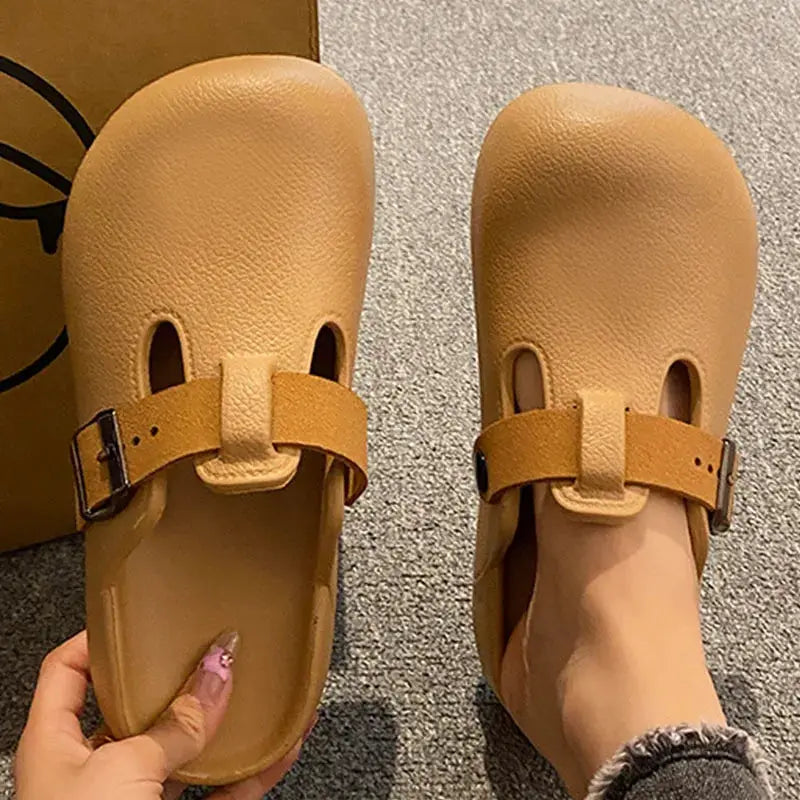 Women's tan EVA garden clogs with buckle straps; lightweight and easy-clean