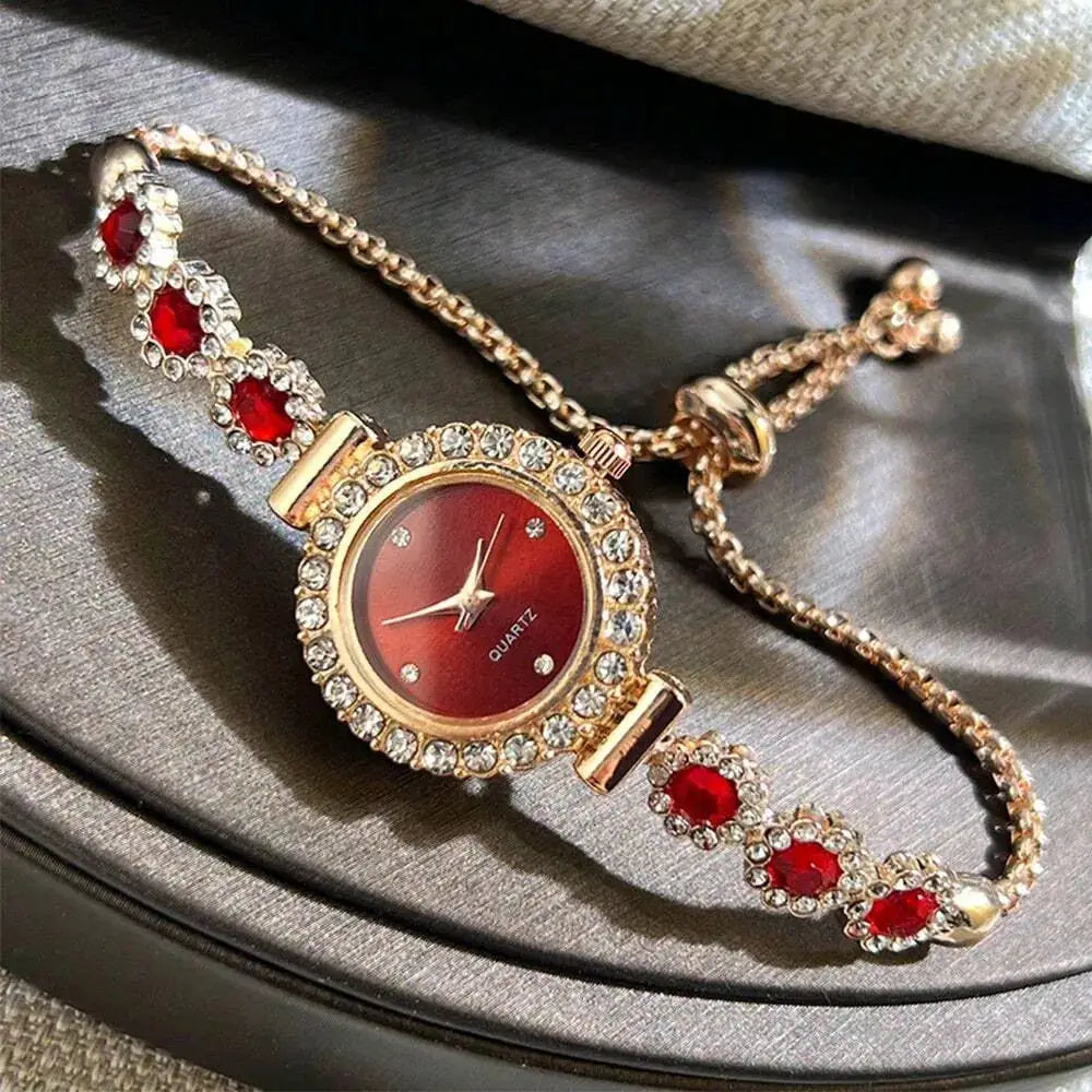 Women’s fashion rhinestone wristwatch with red dial, gold-tone case, crystal bezel