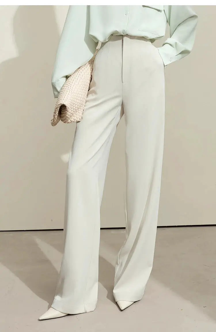 AMII Minimalism Women's Pants cream wide-leg trousers with a beige woven clutch
