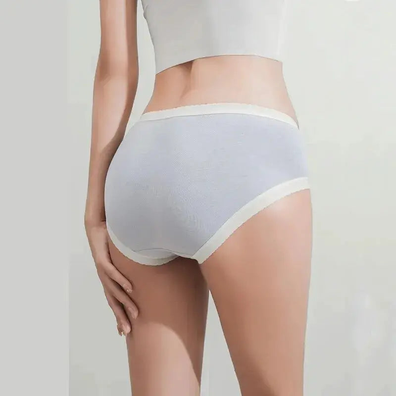 Women's cotton briefs by Simples Market in light blue with white trim, low-rise