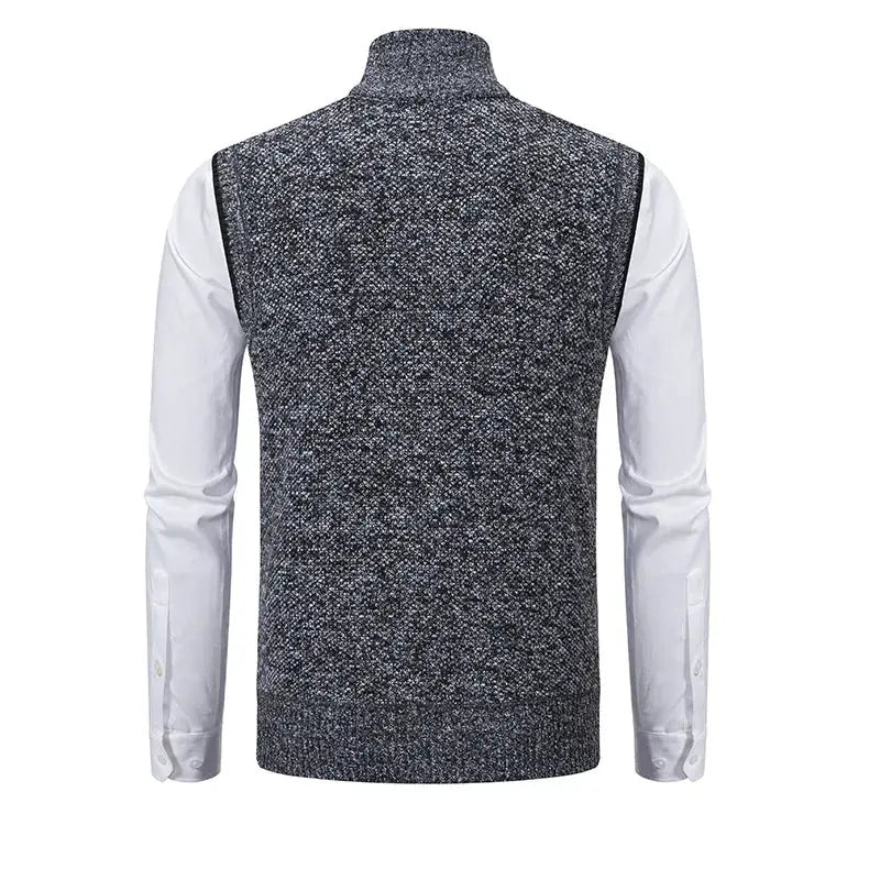 Men's knitted sleeveless sweater vest with stand collar in grey speckled knit, back view over white shirt