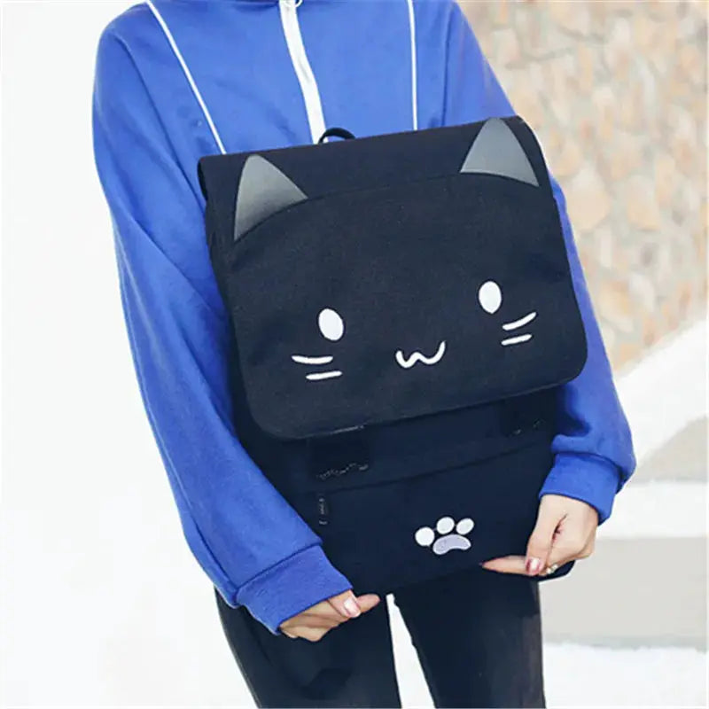 Japanese Stupid Cute 3D Cat large-capacity backpack by Simples Market with a black cat-face flap.