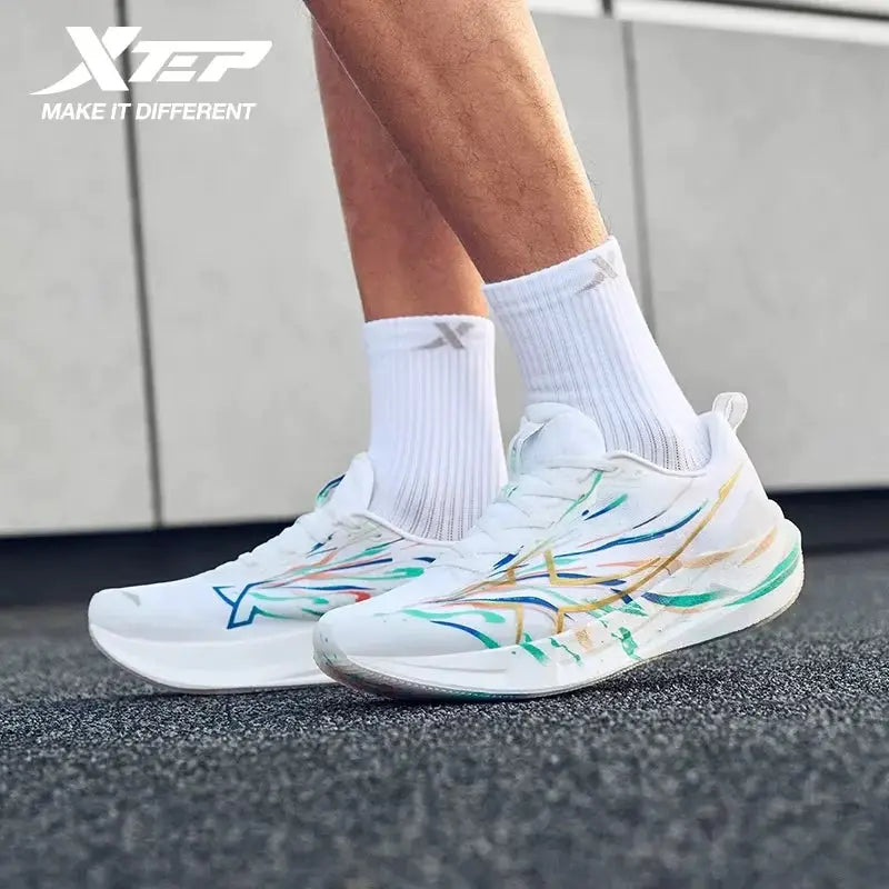 Xtep 2000km 5.0 men's running shoes by Simples Market; white sneakers with colorful abstract stripes and visible Xtep logo