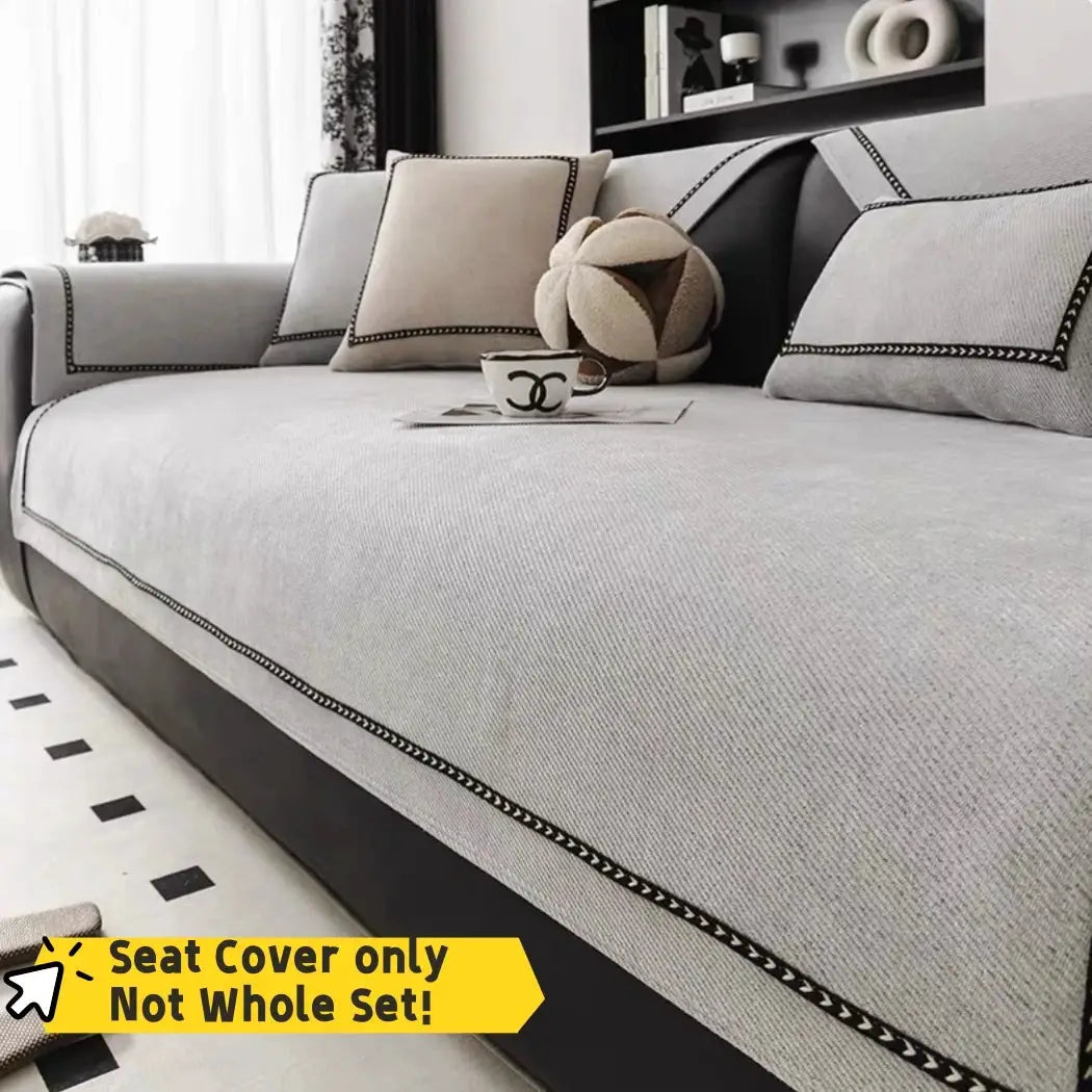 Vintage-style chenille sofa slipcover in gray with black trim; seat cover only for a single-to-four-seater couch.