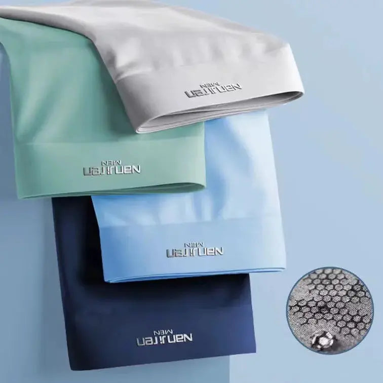 4-pack Simples Market ice-silk boxers for men in white, mint green, light blue, and navy with breathable mesh panel.