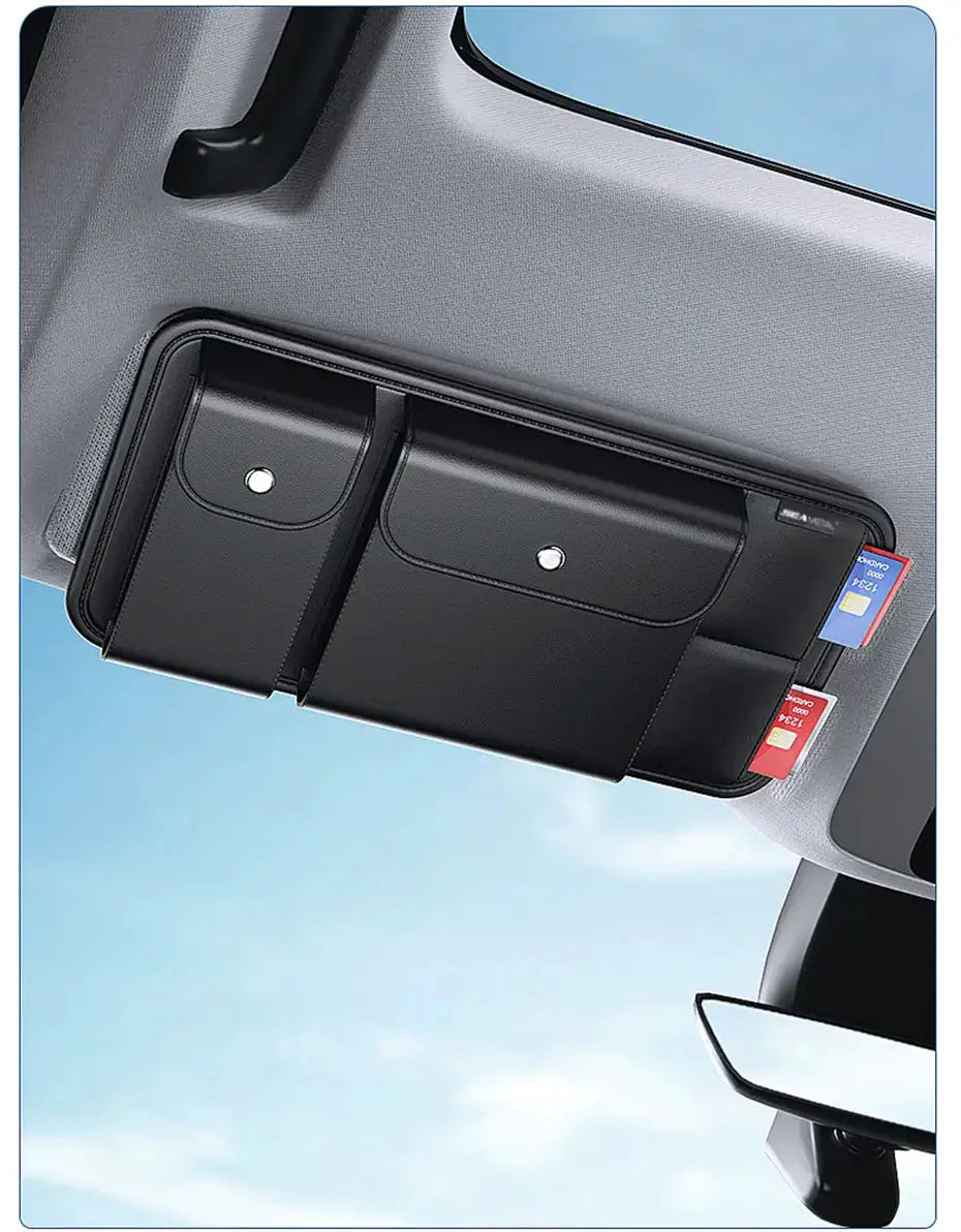 BLALION car sun visor organizer by Simples Market; black leather multi-pocket sunglasses and card holder.