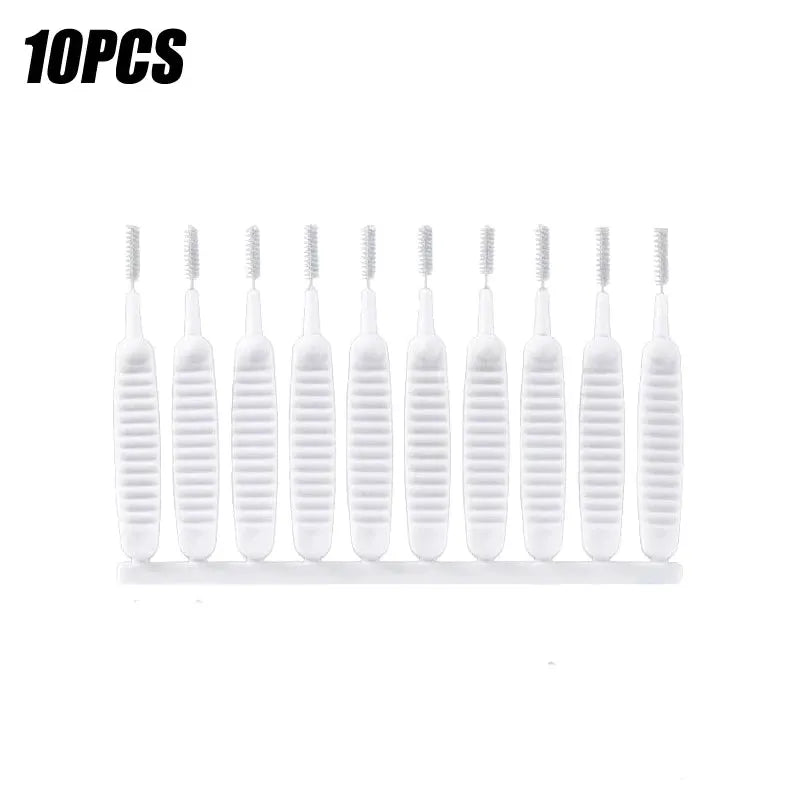 Shower cleaning brush set with white nylon bristle heads on compact white handles, 10 pcs