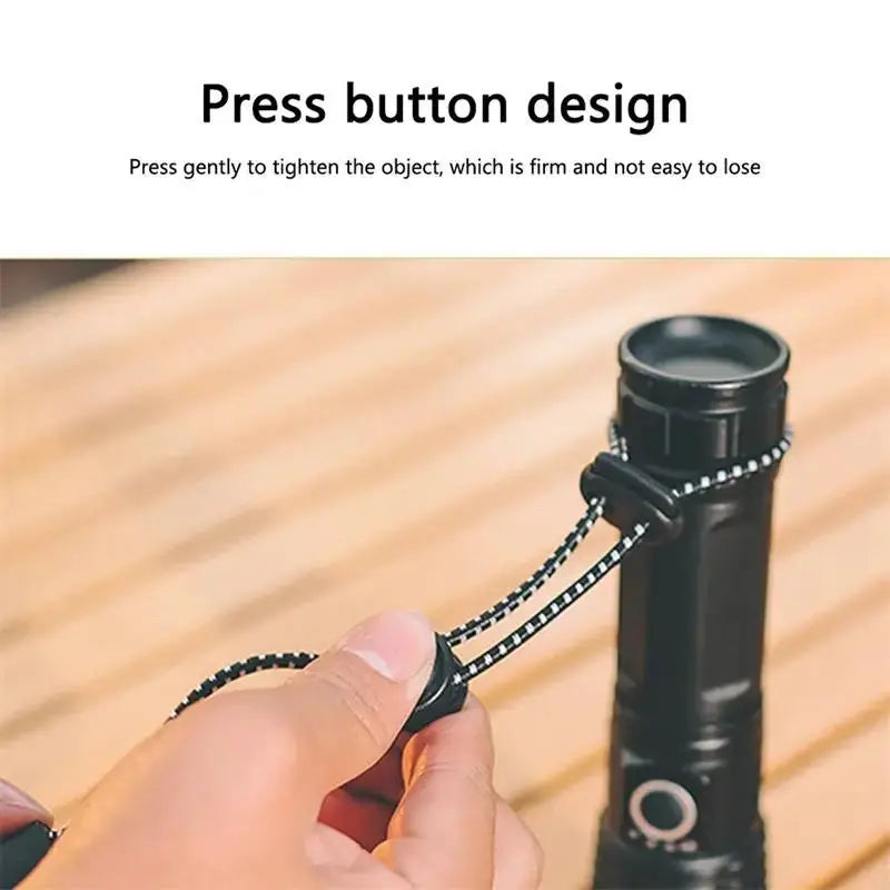 Elastic trekking pole cord for backpacks, black braided with adjustable toggle, securing walking stick