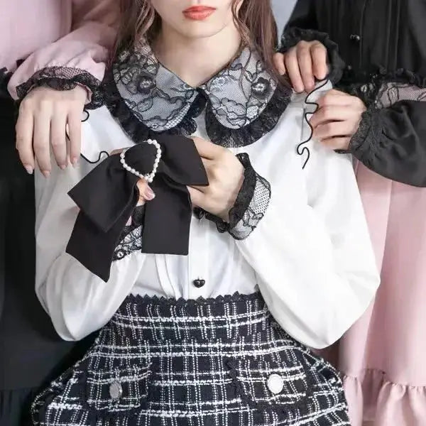 Japanese Gothic Lolita plaid suspender mini skirt in black-and-white with lace trim and bow