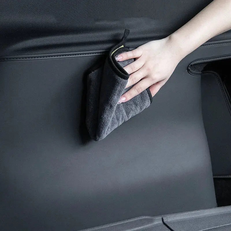 Simples Market Juniper trunk mat for Tesla Model Y; full-coverage cargo liner with side guards in dark gray.