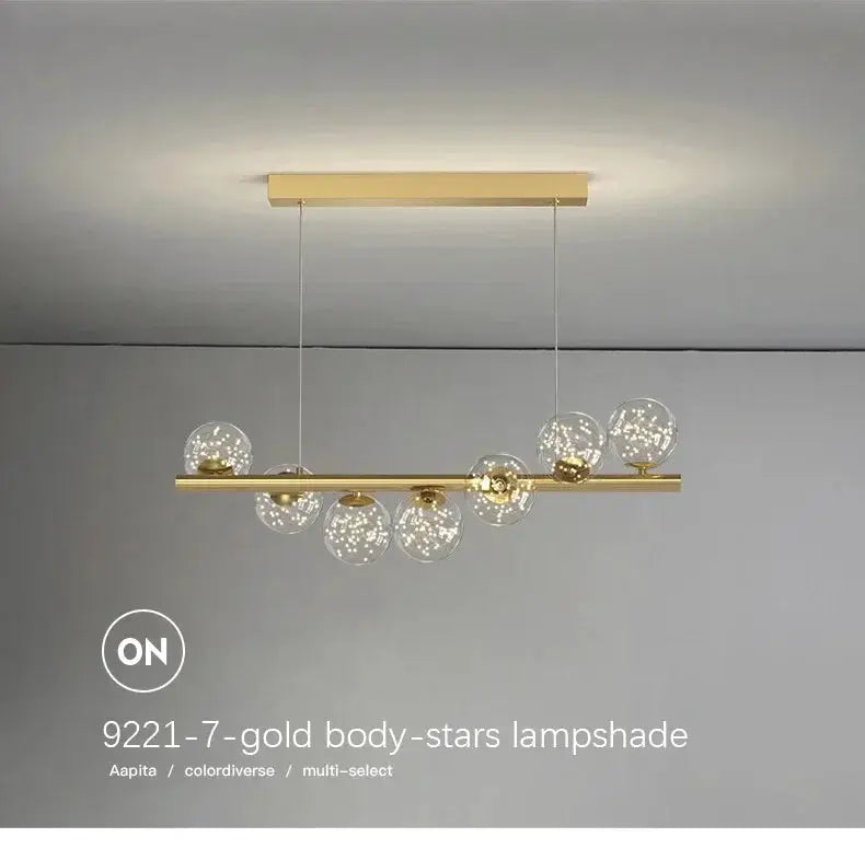 Nordic gold bar chandelier with glass globe bulbs for living room, kitchen or office decor.