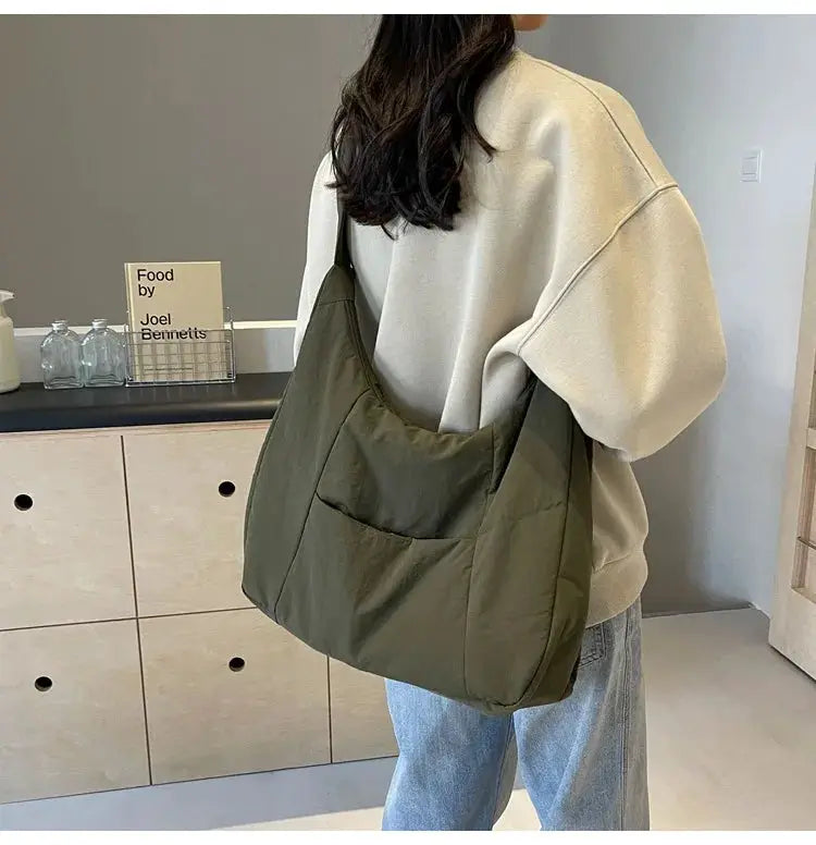 Trendy women's soft-cloth shoulder bag in olive green with front pocket, crossbody style