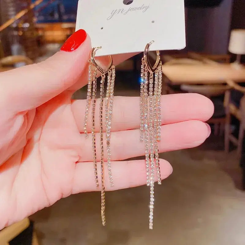 Punk geometric zinc alloy fringe earrings by Simples Market with gold-tone finish and crystal strands, pair