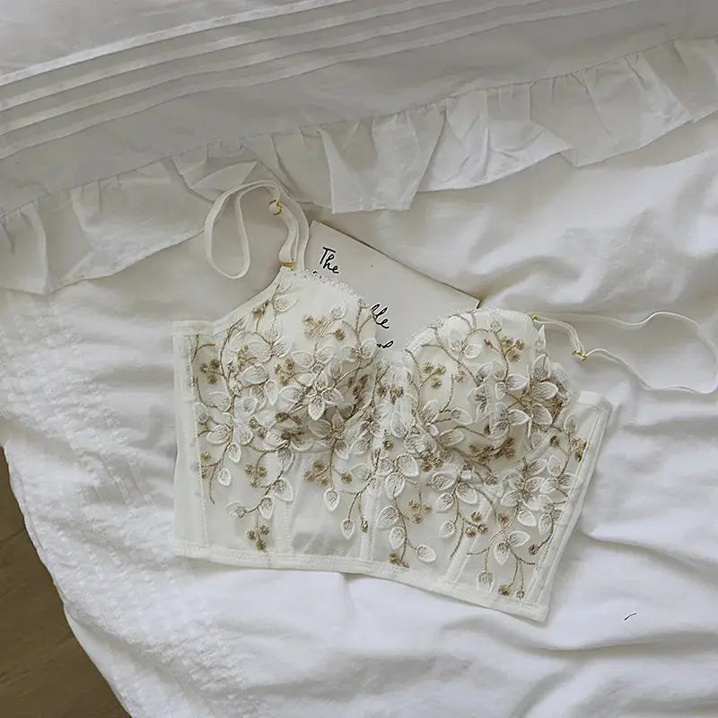 Three-Dimensional embroidered lace bra corset in ivory with floral embroidery and steel rings