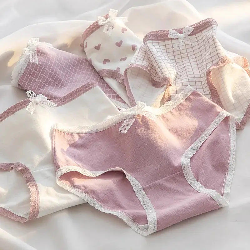 5-piece cotton panties set for women in pink and white with lace trim, bows, and heart pattern by Simples Market