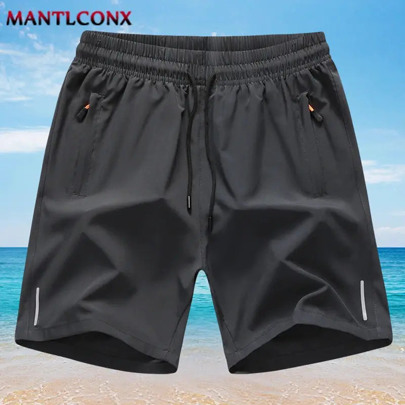 MANTLCONX men's black gym shorts with drawstring, breathable quick-dry fabric, zip pockets, reflective trims.