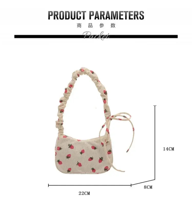 Simples Market women's corduroy strawberry-print underarm bag, cream mini tote with ruched strap.