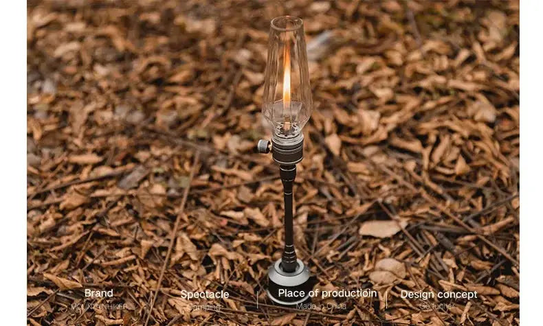 MountainHiker outdoor gas light on dark metal stake with glass chimney, retro camping decor for desktop or bedside use.