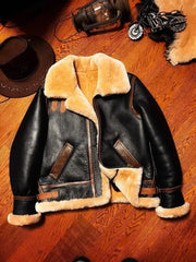 B3 shearling bomber jacket by Simples Market in black leather with tan fur trim
