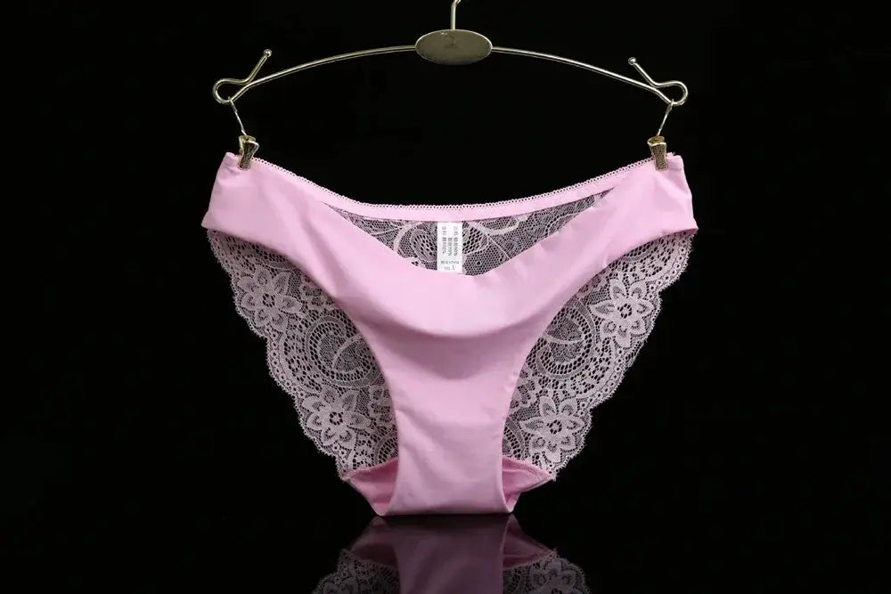 Seamless pink lace panties on hanger; low-rise with intricate lace side panels by Simples Market