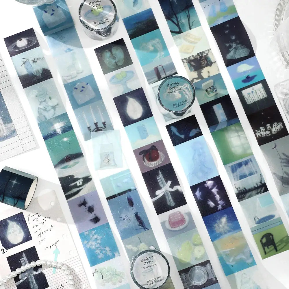 Decorative PET masking tape rolls by Simples Market, 2m each, with blue-toned scenic collage patterns for journaling