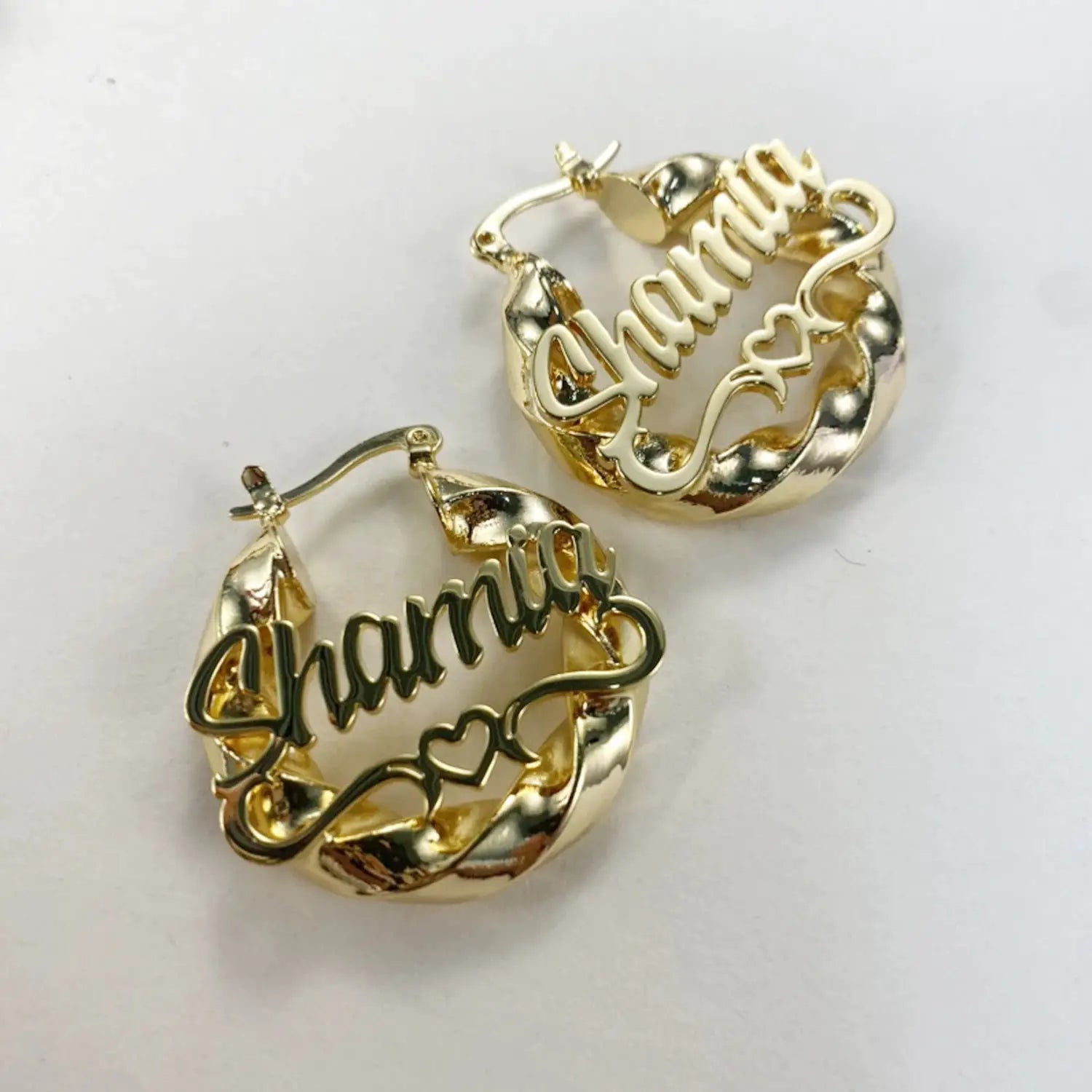 Pair of gold-tone custom-name twist hoop earrings with script name