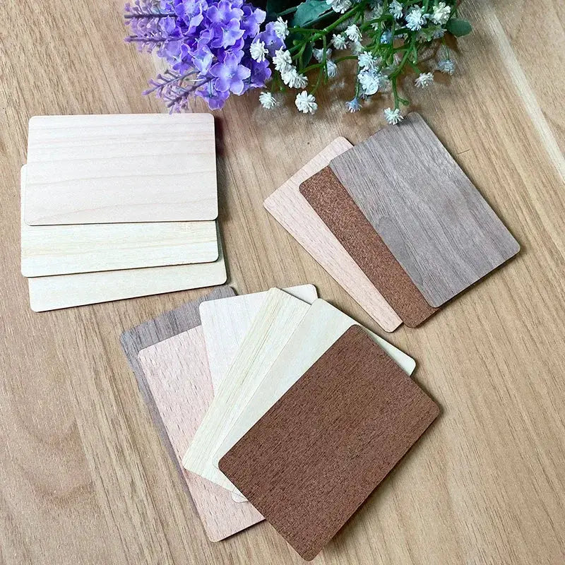 Assorted wooden NFC cards by Simples Market; 13.56MHz RFID tags in brown and beige tones