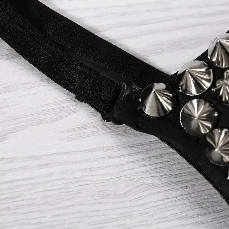 Black wireless steampunk bra top with silver spike studs along the strap.