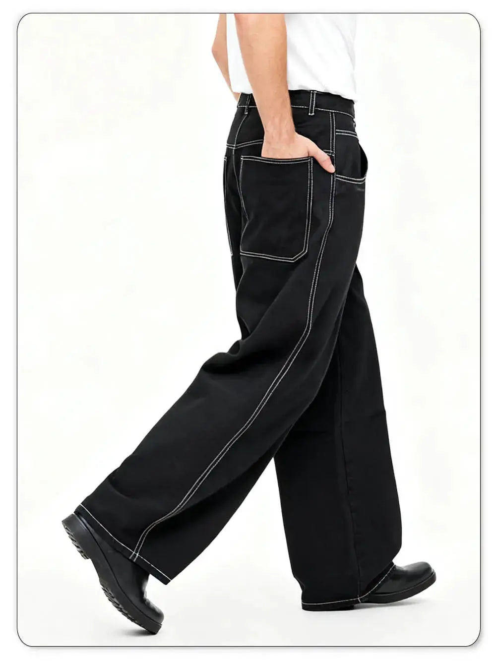 Baggy black denim jeans with wide legs and white contrast stitching